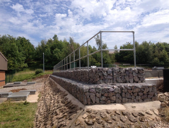 Roof refurbishment over live water