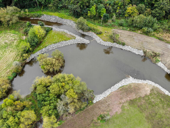 Large-scale weir removal